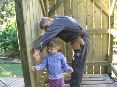 Poppa and Zoe measure walls