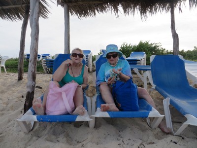 Judy and Sandy relax on the beach